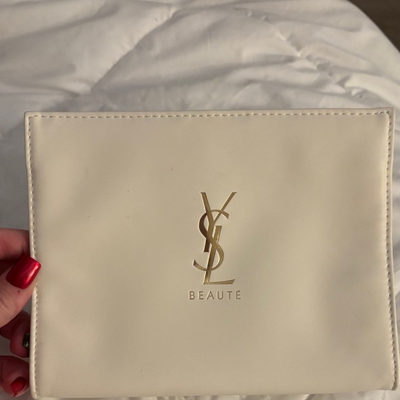 Yves Saint Laurent Handbags - Yves Saint Laurent Cream Cosmetic Bag